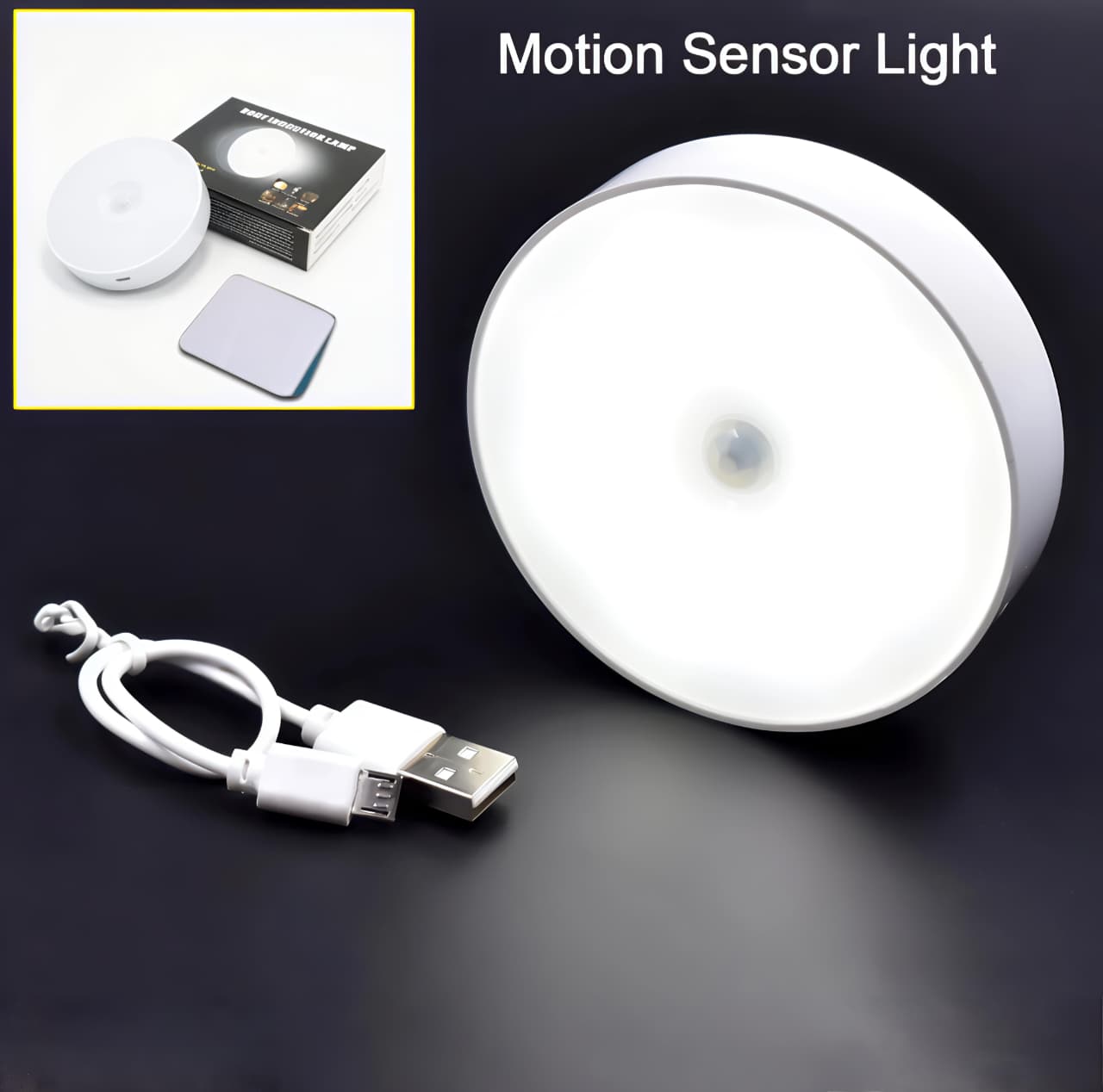 Motion sensor light with USB cable on a dark background