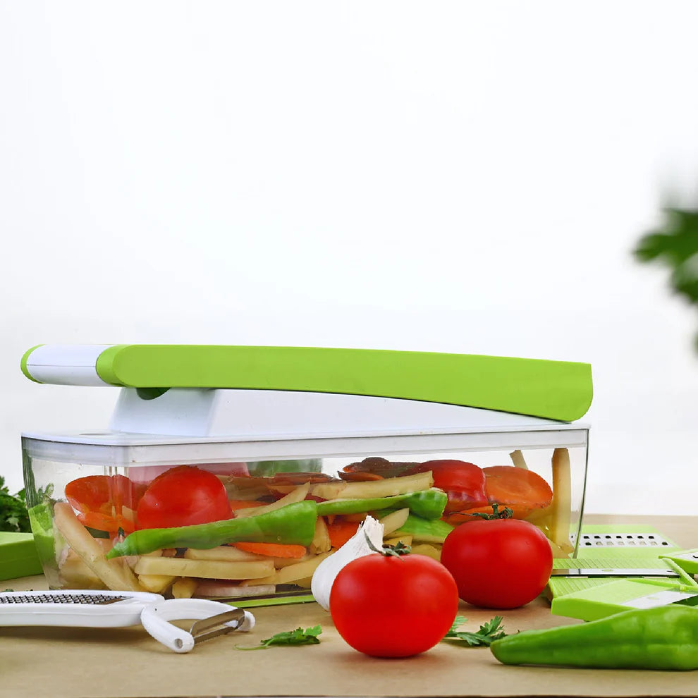 Vegetable chopper with fresh vegetables on a wooden surface